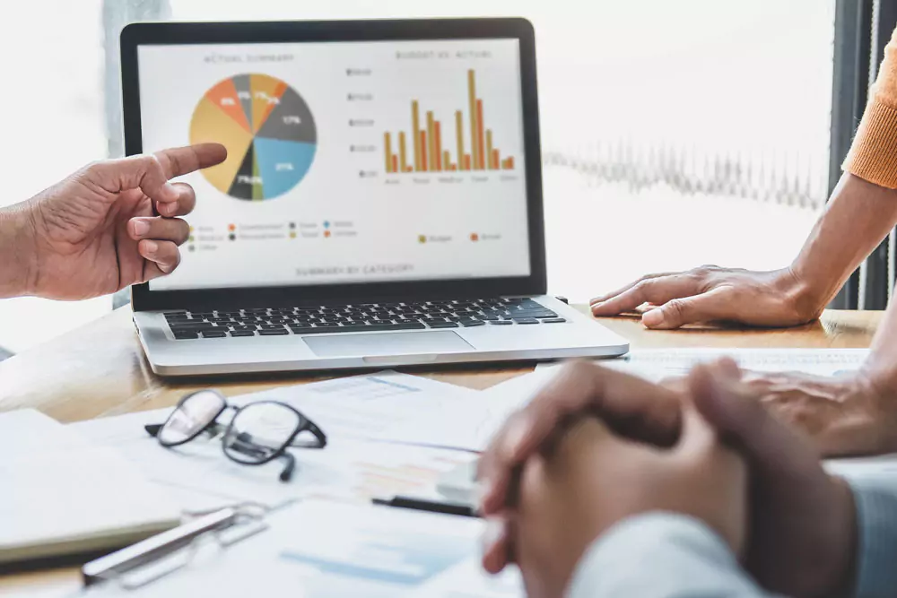 Business team collaboration discussing working analyzing with financial data and marketing growth report graph.